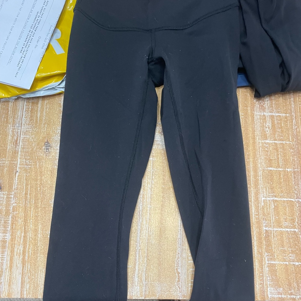 Cropped black lululemon leggings size 2